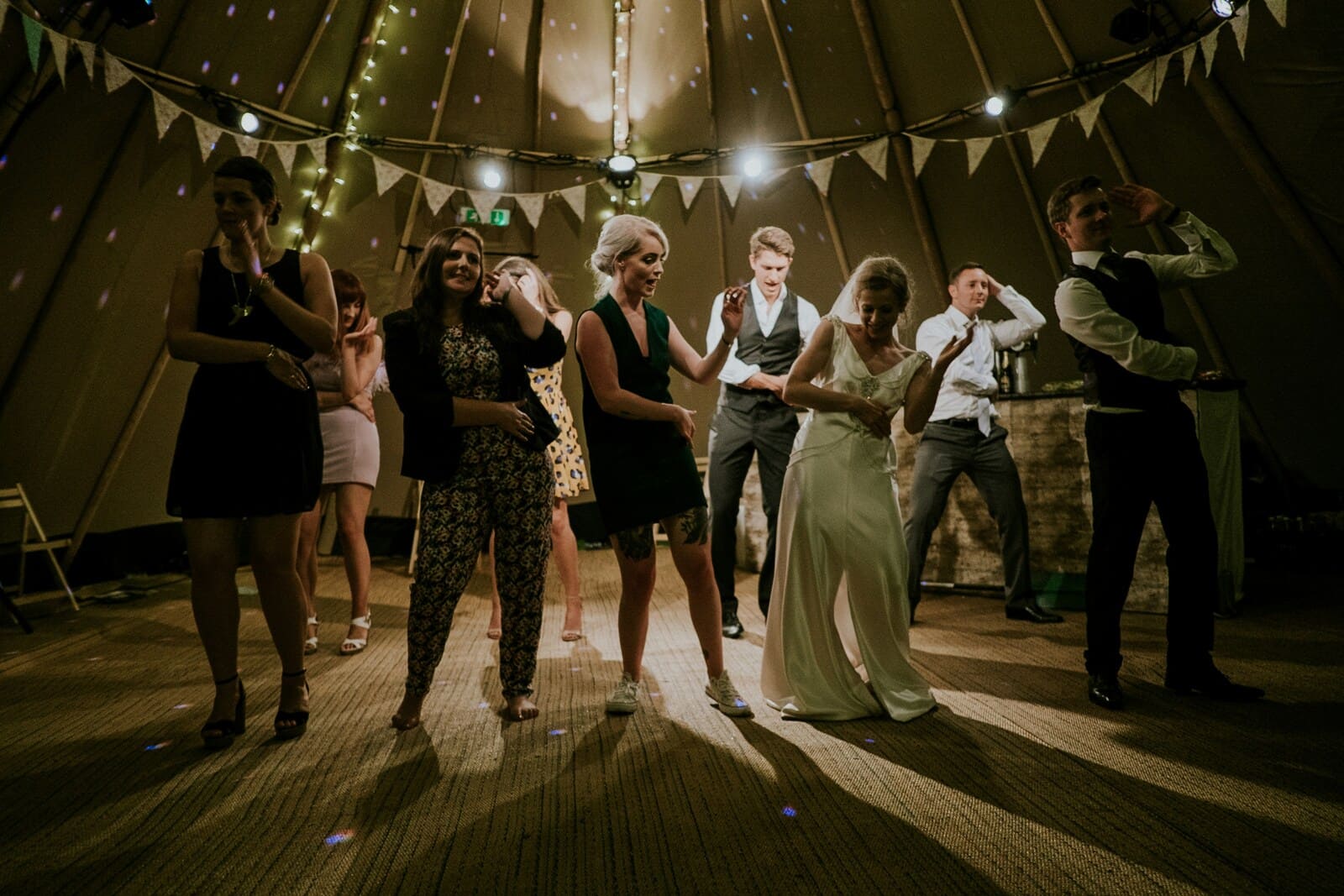 Grand Indian wedding celebration — pipe band and lights in full flow